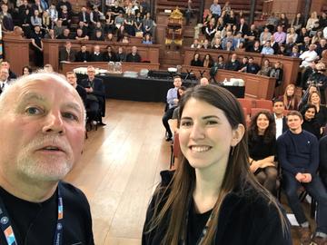Apprenticeship team selfie at University of Oxford Apprenticeship expo & awards with crowd for hashtag competition